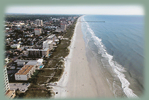 Rotating group of photos displaying different facets of shore protection work with beaches, equipment, buildings, and sand being distributed Rotating group of photos displaying different facets of shore protection work with beaches, equipment, buildings, and sand being distributed
