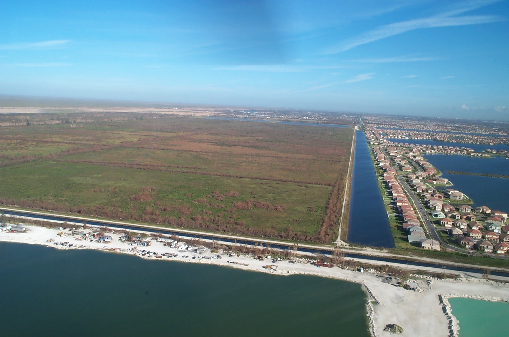 Aerial view of the Broward County Water Preserve Area project area showing one of the water conservation areas and the adjoining canal.